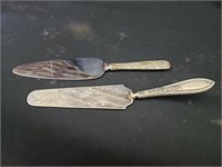 2) sterling handled cake servers/ one marked