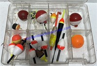 Clear Plano Tackle Box With Some Bobbers