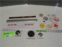 Paperweights, rulers and town celebration pins
