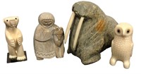 Four Inuit Stone and Bone Figural Carvings