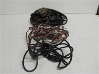 Black electric cord with 4 plug box and other cord