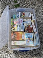 Plastic tote full of books