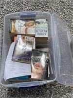 Plastic tote full of books