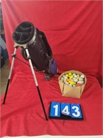 golf bag backpack and box of used balls