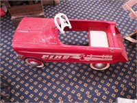 Vintage red pedal car, 36" long marked