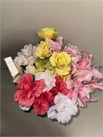 Bucket of fake cemetery flowers