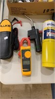 Propane torch and gas tank with a fluke true