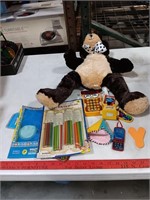 Teddy bear, Lip Smacker skittles, Calculator,