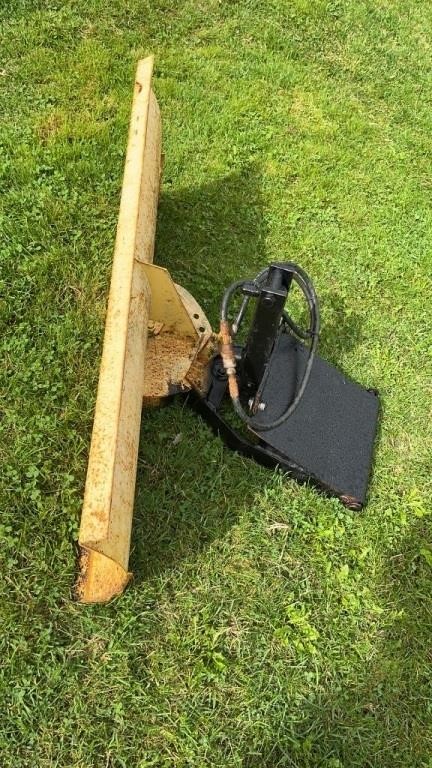 A SNOW BLADE ATTACHMENT FOR A LAWN MOWER TRACTOR