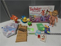 Twister game, card games, abacus, rubber doll and