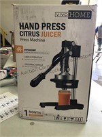 Hand press citrus juicer press machine.