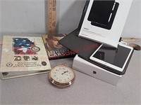 Johnny Carson DVDs, Seiko clock, iPad tablet in