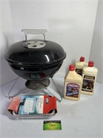 Small Weber Grill with Lighter Fluid and Drip