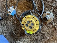 Electric cord reel and heavy duty plug in