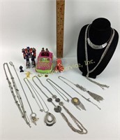 Costume jewelry necklaces, toys