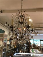 Decorative brass chandelier with glass tear drops