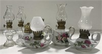 Various antique mini oil lamps, some matching set