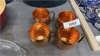 Set of four mule cups