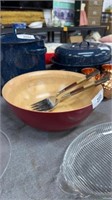 Wooden salad bowl with fork and spoon