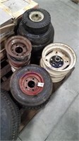 Assorted tires--some on rims, assorted rims