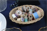 WOOD SPOOL SEWING THREAD IN BASKET