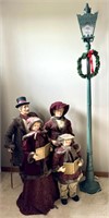 Christmas Carolers with Lamp. Lamp Measures 71”