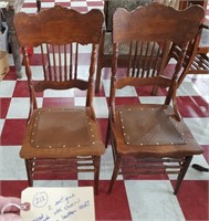 2 antique oak pressed back chairs leather seats