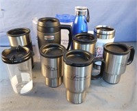 Plastic and metal thermos', plastic cups. Most