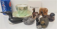 Lot of figures and a teacup