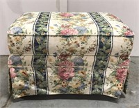 Floral ottoman on caster wheels