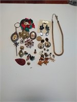 Great assortment of costume brooches, pierced