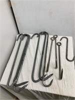 10 meat hooks. Assorted. 12” to 23”