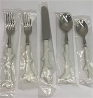 Group Of Flatware With White Coral Design Handles