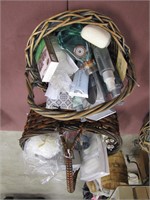 2 basket of bath & body items: loofa, candles,
