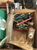 Box of assorted gun supplies
