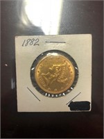 1882 ten D. Gold coin