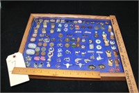 Shadow box filled with unique cuff links