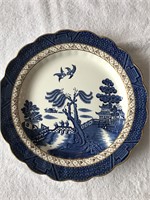Blue willow plate with gold trim