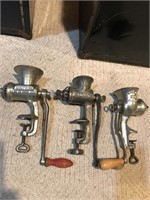 Three Meat grinders