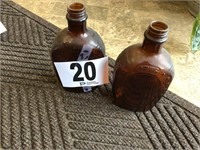 (2) Brown Bottles
