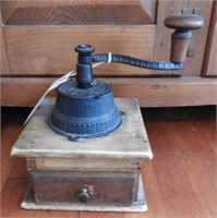 Primitive cast iron coffee mill with single
