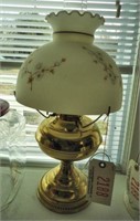 Brass Polished Rayo lamp with floral dogwood