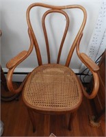 Oak bentwood Cane seat open arm chair