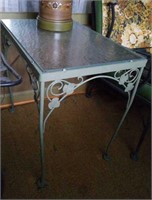 Glass top green wrought iron patio table