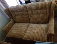 Rocking 2 seat couch, earth tone stripe material,