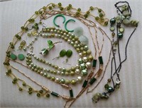 Green tone necklaces, earrings and one brooch,