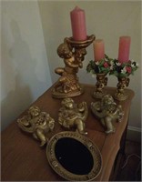 Cherub figures, candle holders, wall plaques