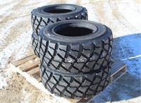 (4) Caterpillar 12-16.5 Skid Steer Tires