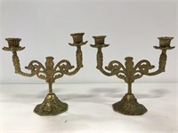 Brass tribal candelabra pair
