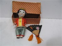 Oriental doll in box